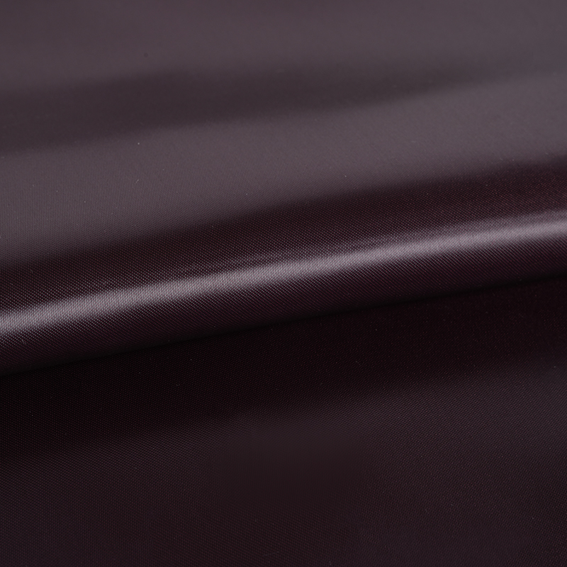 Kationisk satengstoff