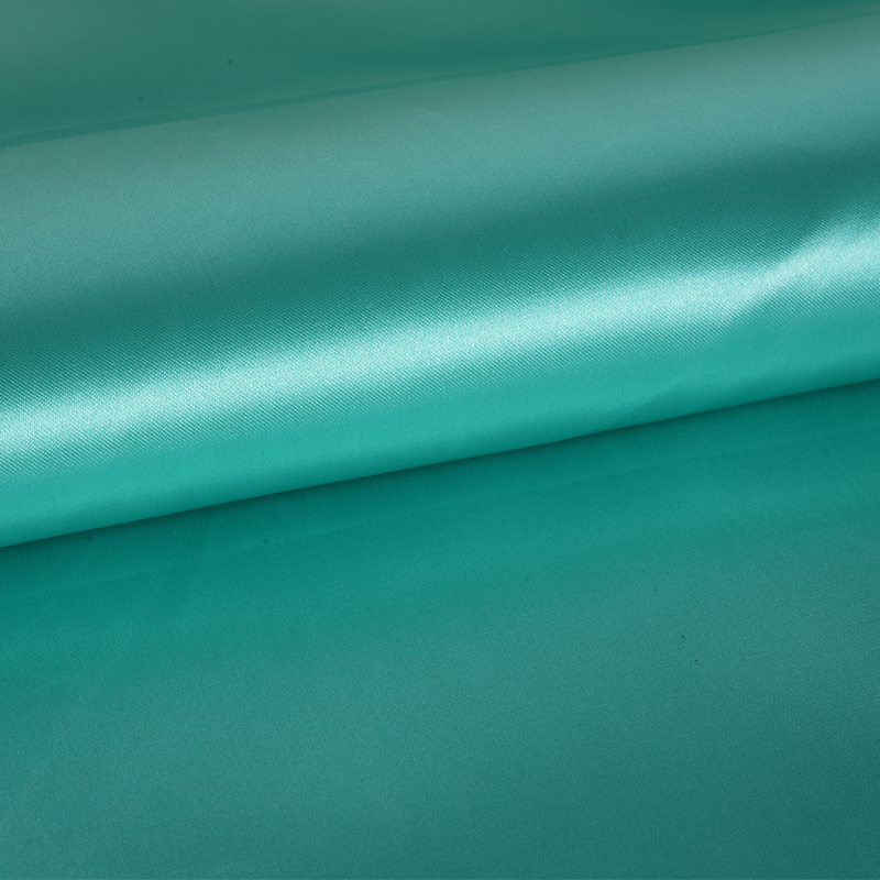 50/75 glanset ikke-vridet sateng + tynn padle på stoffet